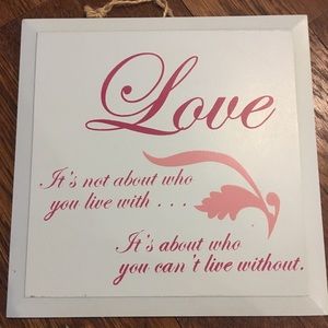 Love is about who you can’t live without wood sign